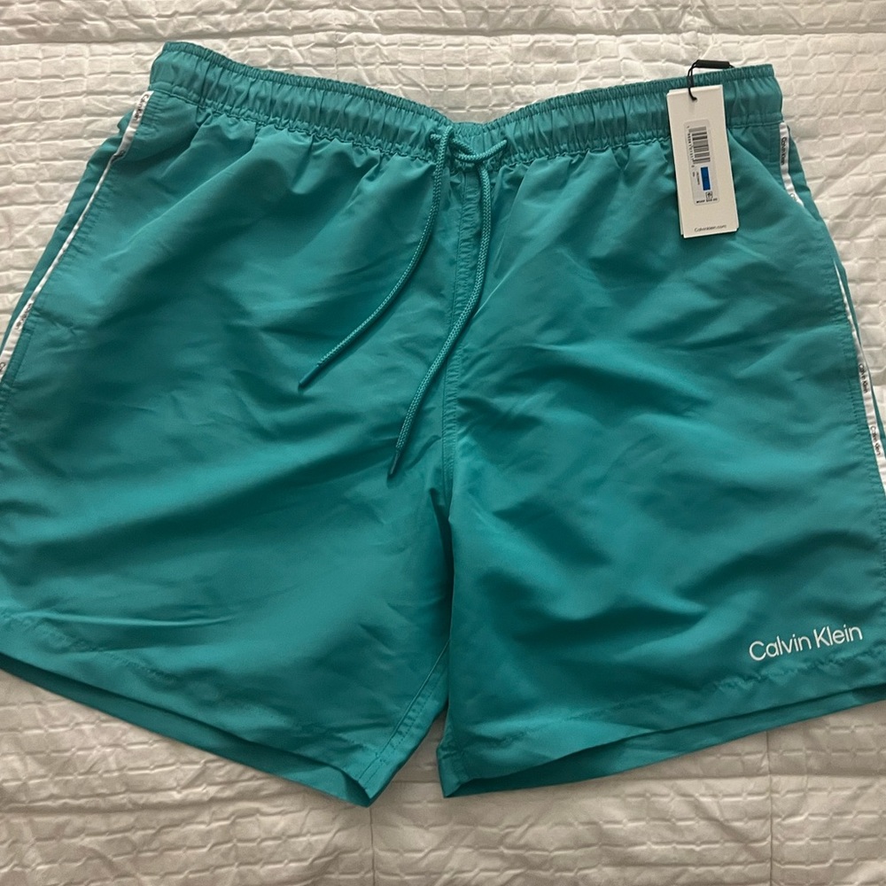 Calvin Klein Men’s swimsuit in XL, turquoise, NWT.